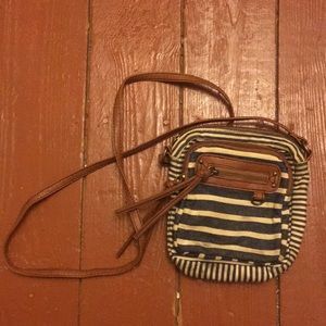 Striped cross body bag: brand is “American Eagle”